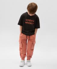 Брюки-джоггеры для мальчика с карманами-карго из вареного футера терракотовые  (122) Gulliver