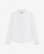 Блузка трикотажная для девочки с кружевным жабо и жемчужными пуговицами белая  (122) Gulliver