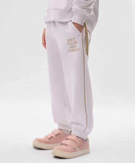 Брюки-джоггеры для девочки из футера белые Gulliver