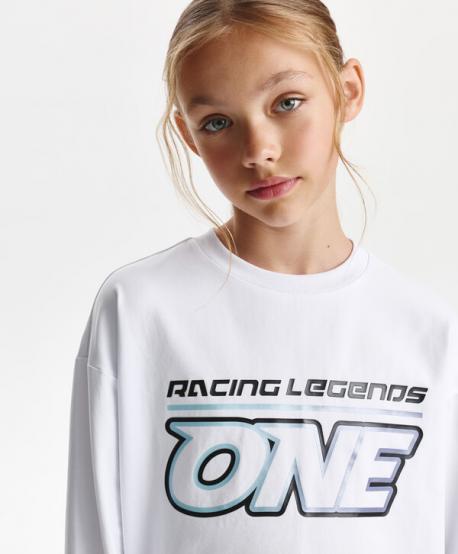 Лонгслив для девочки свободной формы с принтом белый  (146) Gulliver