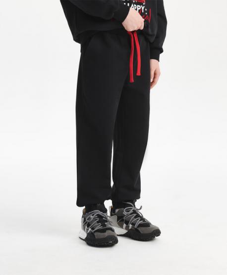 Брюки-джоггеры для мальчика трикотажные черные  (122) Gulliver