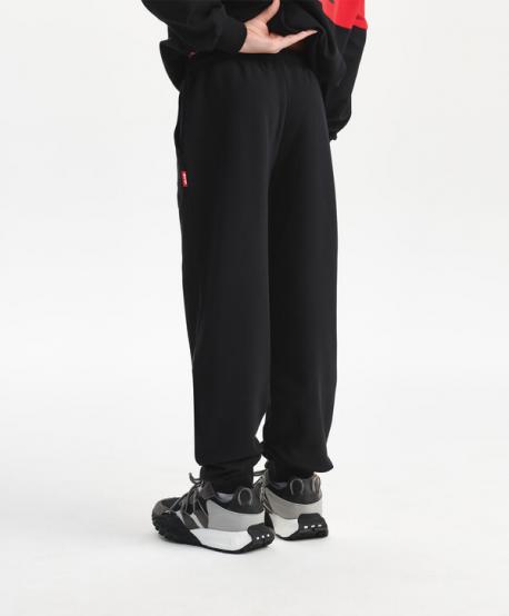 Брюки-джоггеры для мальчика трикотажные черные  (122) Gulliver