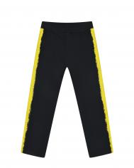 Черные спортивные брюки с желтыми лампасами Moschino